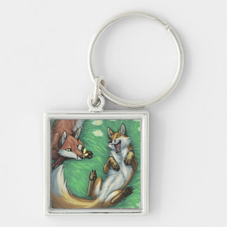 Playful foxes keychain