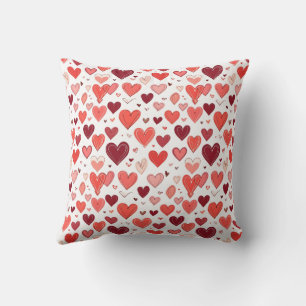 Playful hand drawn red hearts pattern on white  throw pillow