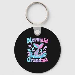 Playful mermaid tail with water splashes design keychain