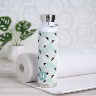 Playful Penguins Sliding on Snow Pattern Water Bottle