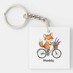 Playful Woodland Fox Riding Bike Keychain