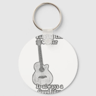 Playing the guitar is always a good idea. B & W Keychain