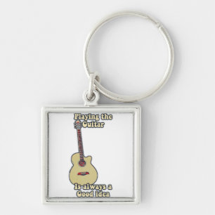 Playing the guitar is always a good idea. keychain