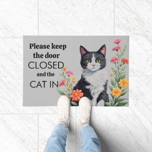  please keep the door closed and the cat(s) in  doormat
