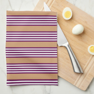 Plum and white five stripes pattern with tan kitchen towel