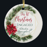 Poinsettia, Our 1st Christmas Engaged Photo Ceramic Ornament<br><div class="desc">Celebrate your First Christmas Engaged with this elegant ornament. It features a watercolor Poinsettia with an arrangement of mistletoe, pine branchlet, pine cone, holly and berries. "Our 1st Christmas" (written in script typography) - are the image files. You can remove it and adjust text according to your requirements. On the...</div>