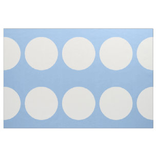 Pois blanc surdimensionné sur le tissu bleu-clair