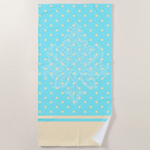 Pois bleu et serviette de plage jaune
