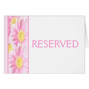 Poissons de Gerbera rose sur carte blanche réservé