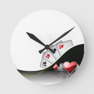 Poker cards and casino symbols round clock