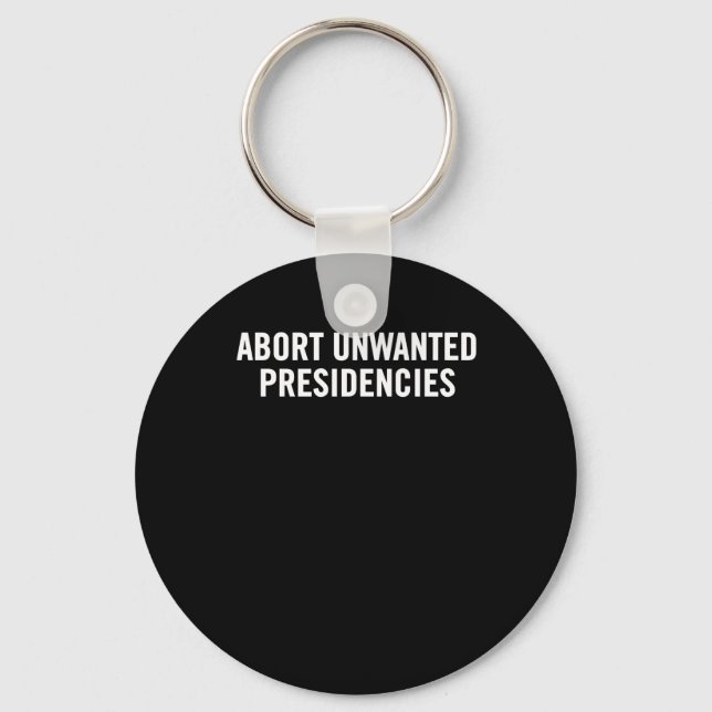 Political Resistance Art – Abort Unwanted Presiden Keychain (Front)