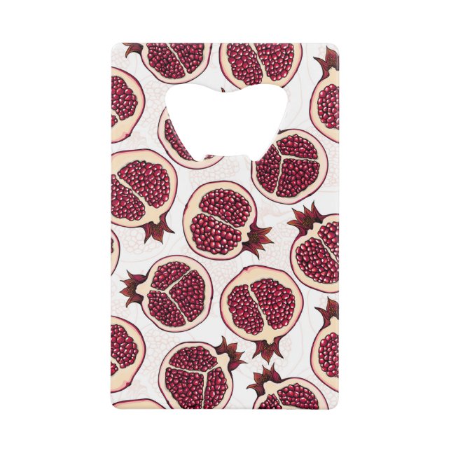 Pomegranate slices on white credit card bottle opener (Front)