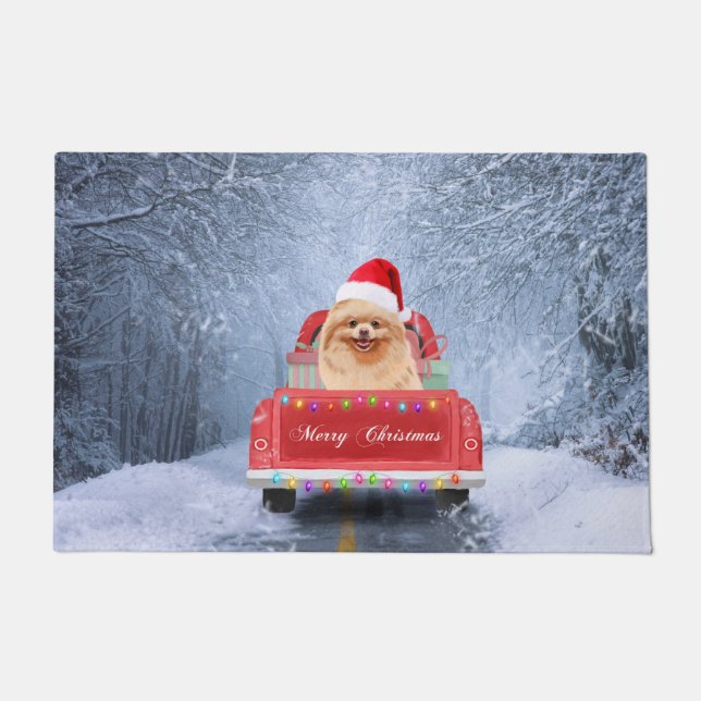 Pomeranian Dog in Snow sitting in Christmas Truck  Doormat (Front)