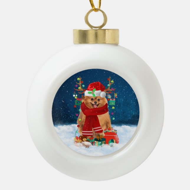 Pomeranian dog with Christmas gifts Ceramic Ball Christmas Ornament (Front)