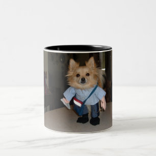pomeranian in mailman costume Two-Tone coffee mug
