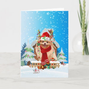 Pomeranian in snow with Christmas gifts  Card