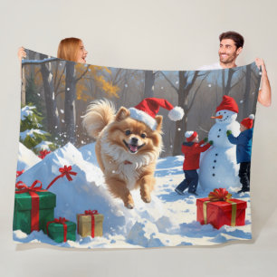 Pomeranian Running in Snow with Christmas Hat Fleece Blanket