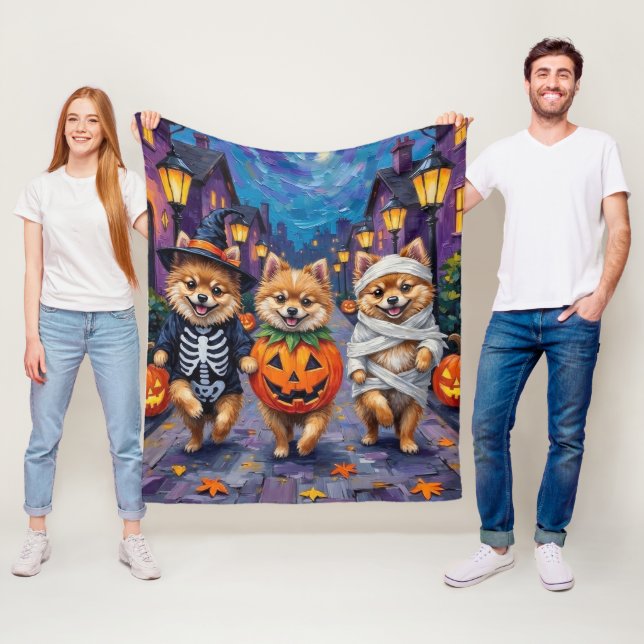 Pomeranian Trick-or-Treating in Halloween Costumes Fleece Blanket (In Situ)