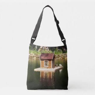 Pond with birds house and alphine slide crossbody bag