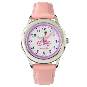 Pony-tailed Young Girl Riding a Pink Bicycle Watch