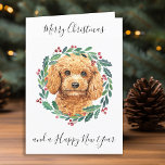 Poodle Merry Christmas Trendy Dog  Holiday Card<br><div class="desc">Send christmas greetings this holiday season with this elegant Merry Christmas poodle in a wreath design card, and matching decor. This apricot poodle holiday card features a watercolor dog in a green and red wreath with holly and berries. Personalize with family name . This poodle christmas card will be a...</div>