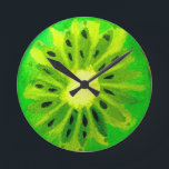 Pop art bright kiwi fruit original watercolour round clock<br><div class="desc">A cute and colourful vibrant kiwi fruit slice from an original painting by artist Sacha Grossel. This large pop art style fruit is green and very bright and colourful against a customisable yellow coloured background. Quirky and original.</div>