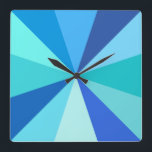 Pop Art Modern 60s Funky Geometric Rays in Blue Square Wall Clock<br><div class="desc">This hip,  retro 60s-inspired pop art square clock has psychedelic blue rays / sunbursts shooting out in a geometric pattern. There are twelve rays to mark the time - no need for numbers on this funky,  minimalist,  ultra-mod clock. It's groovy,  baby.</div>