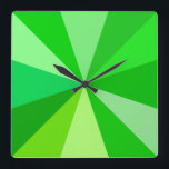 Pop Art Modern 60s Funky Geometric Rays in Green Square Wall Clock<br><div class="desc">This hip,  retro 60s-inspired pop art square clock has psychedelic green rays / sunbursts shooting out in a geometric pattern. There are twelve rays to mark the time - no need for numbers on this funky,  minimalist,  ultra-mod clock. It's groovy,  baby.</div>