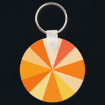 Pop Art Modern 60s Funky Geometric Rays in Orange Keychain<br><div class="desc">This hip,  retro 60s-inspired pop art design has psychedelic orange rays / sunbursts shooting out in a geometric pattern. This funky,  minimalist,  ultra-mod design has twelve rays in varying shades of orange. It's groovy,  baby.</div>