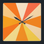 Pop Art Modern 60s Funky Geometric Rays in Orange Square Wall Clock<br><div class="desc">This hip,  retro 60s-inspired pop art square clock has psychedelic orange rays / sunbursts shooting out in a geometric pattern. There are twelve rays to mark the time - no need for numbers on this funky,  minimalist,  ultra-mod clock. It's groovy,  baby.</div>
