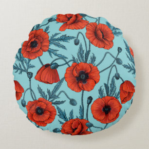 Poppies, red and blue on pool blue round pillow