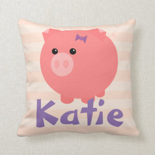 Porc potelé mignon avec le coussin rose de rayures