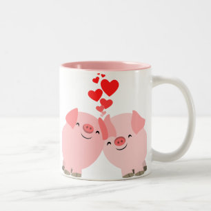 Porcs mignons de bande dessinée dans la tasse