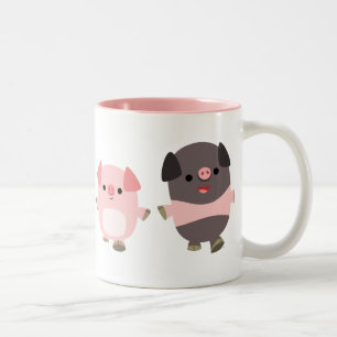 Porcs mignons de bande dessinée sur une tasse de