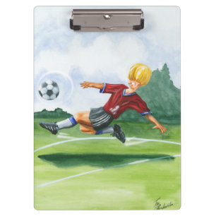 Porte-bloc Footballeur donnant un coup de pied une boule par