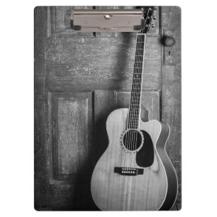 Porte-bloc Guitare penchée contre porte en noir et blanc