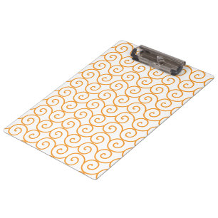 Porte-bloc Un tapis marron et orange avec un motif répétitif