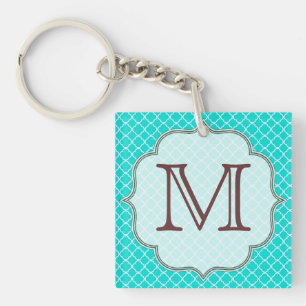 Porte - clé initial du quart-feuille turquoise Lat