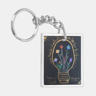 porte - clé "Toujours une lumière"