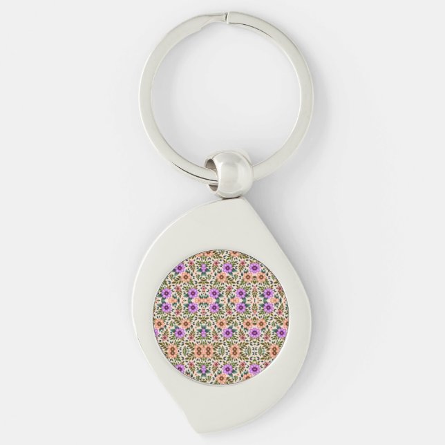 Porte-clés A metallic keychain with a colorful mosaic design  (Devant)
