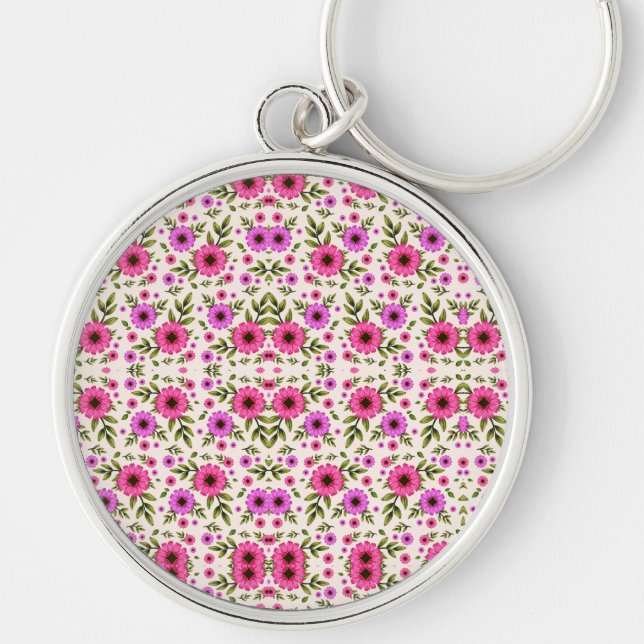 Porte-clés A round keychain featuring a colorful floral  (Devant)