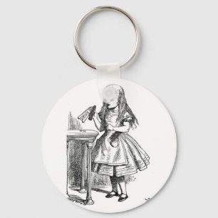 Porte-clés Alice avec la "boisson je" bouteille