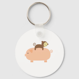 Porte-clés Bébé singe équitation sur un cochon