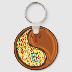 Porte-clés Béliers et serpent à bois