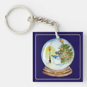 Porte-clés Boule à neige de Noël avec bonhomme de neige et ar