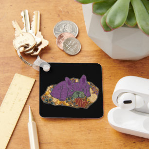 Porte-clés Bulldog français sur oreillers