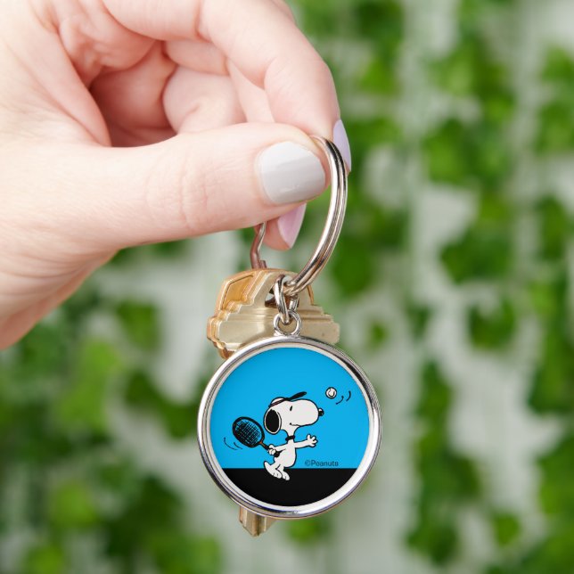 Porte-clés cacahuètes | Snoopy Joue Au Tennis (main)