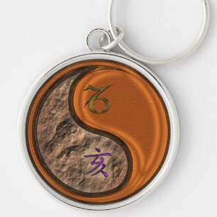 Porte-clés Capricorn et Porte - clé de sanglier