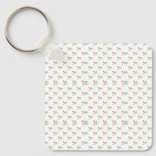 Porte-clés carré avec motif "M" en vert, orange,
