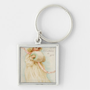 Porte-clés Carte de Noël dépeignant une fille avec un manch